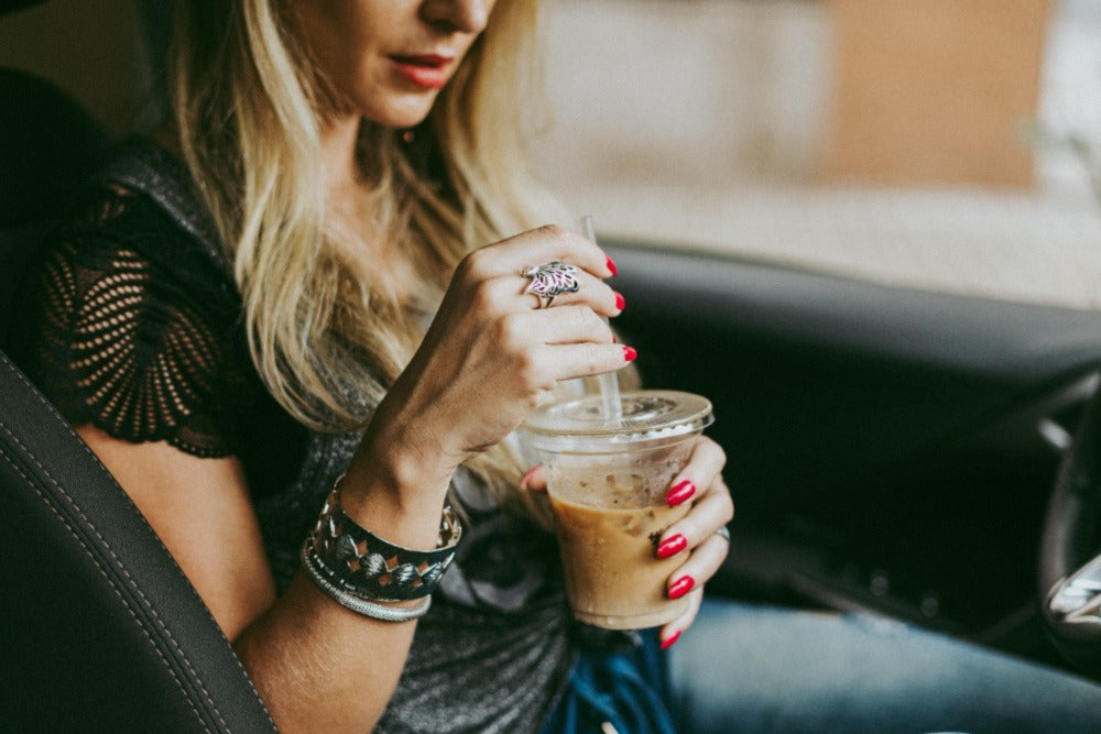 Lady drinking iced coffee